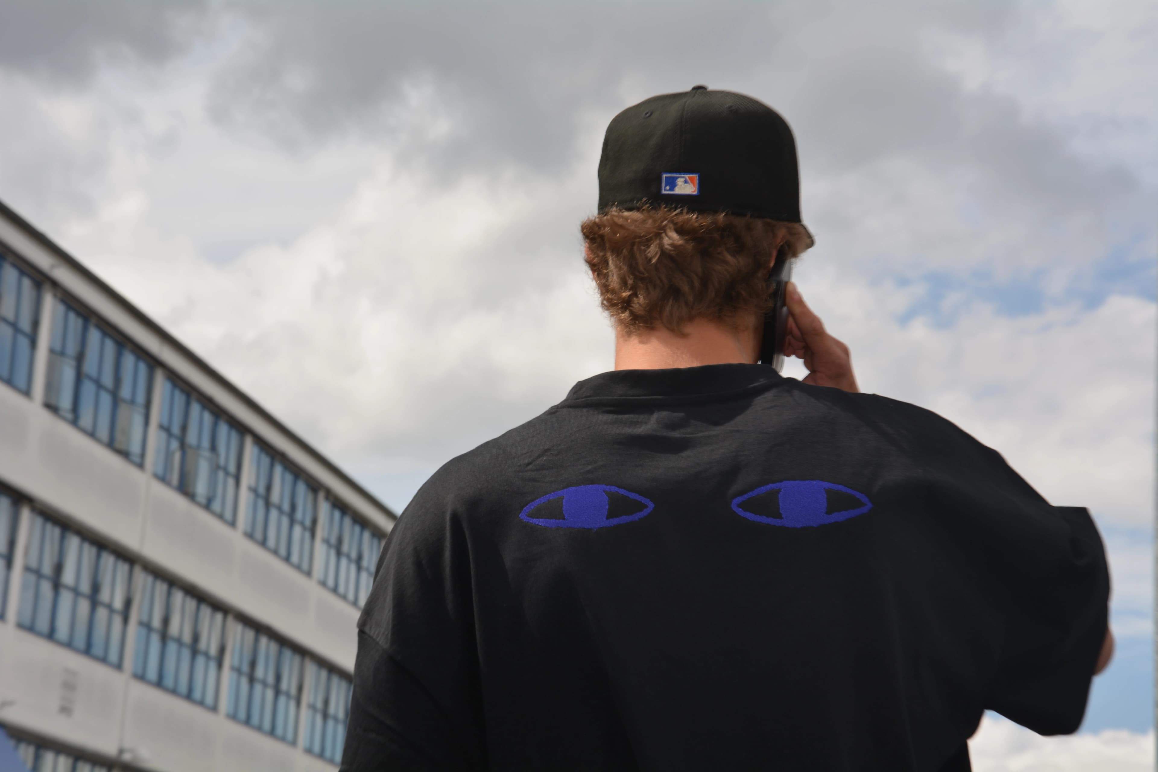 background image showing model with Blue Eyes product